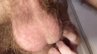 Close-up view of my very hairy ass, uncut cock, and balls from behind